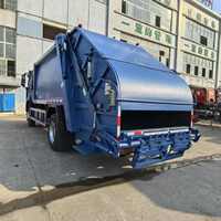 Camion Compacteur à Ordures Bleu Personnalisé HOWO 4X2 RHD avec Transmission Manuelle, Pompe et Moteur, Capacité 14 m³ 10-15 Tonnes