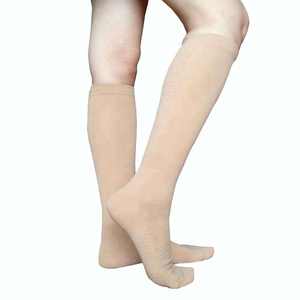 Kaus kaki kompresi telanjang kustom kaus kaki kompresi pijat kaki refleksologi spandeks nilon setinggi lutut manufaktur kaus kaki kompresi - Product Image 1