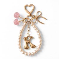 Porte-clés en perles doux et féminin avec lettre, fermoir en forme de cœur, ornement de sac en métal rose pailleté avec cerise et nœud