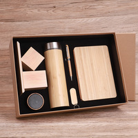Ensemble cadeau éco-responsable en bambou avec logo personnalisé : haut-parleur, clé USB, bloc-notes, stylo
