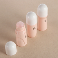 Flacon à bille en verre de 70/100 ml, formes variées, jaune clair/rose, avec bouchon orange/blanc pour emballage cosmétique