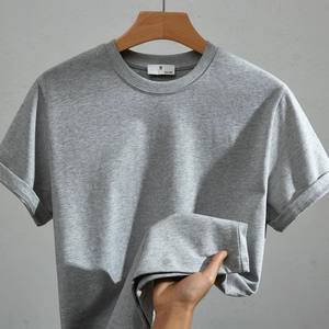 Camisetas de algodón liso personalizables para hombre, venta al por mayor, camisetas de manga corta con cuello redondo para imprimir patrón sólido de longitud corta - Product Image 3