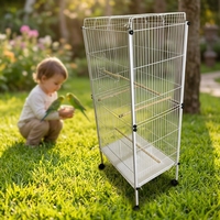 Volière verticale en métal avec porte supérieure, perchoirs en bois à niveaux, roulettes mobiles pour un placement flexible dans les pièces de la maison