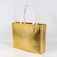 Cosmétique réutilisable personnalisé Vêtements Shopping Tote Brillant Texture Or Non Tissé Sac Avec Logo Noir Imprimé