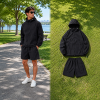 Ensemble deux pièces de survêtement pour homme, veste coupe-vent en nylon noir à capuche et short, fabrication sur mesure OEM de haute qualité