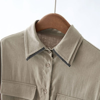 Cravate de serrage de taille en lin de tempérament simple de haute qualité Robe longue de style chemise à col perlé exquis