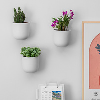 Jardinière murale à montage facile Décoration murale au design élégant pour l'intérieur, balcon et jardin Pots de plantes suspendus en céramique