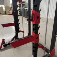 Rack de musculation commercial Smith Machine Power Cage 75x75mm en tube d'acier de 3mm avec barre de traction, Landmine, crochets en J et bras pour salle de sport CE ISO OEM