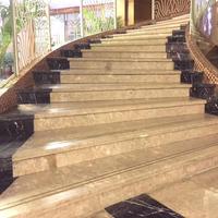 Carrelage d'escalier en marbre arc-en-ciel de Chine, design moderne d'escalier en marbre jaune en spirale droite pour l'intérieur et l'extérieur