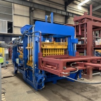 Machine à blocs de béton hydraulique entièrement automatique QT10-15 pour la production de briques multi-produits