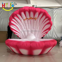 Chaise géante gonflable en forme de coquille de sirène pour la promotion des parcs d'attractions, la décoration d'événements et l'affichage de décors