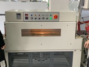 Máquina de envasado retráctil de vajilla automática tipo L, máquina de túnel retráctil, película de POF doblada central - Product Image 4