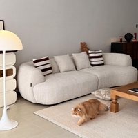 Canapé d'angle minimaliste italien en chenille courbé à trois places avec pieds en métal, design de luxe pour appartement