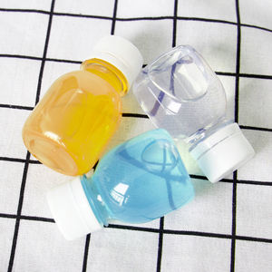 <span class=keywords><strong>Cosmo</strong></span> 60ml 250ml Bouteille de boisson en plastique PET transparente 2oz Bouteille de vin de fruits scellée à usage industriel pour l'emballage de l'eau - Product Image 3