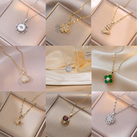 LUOYUNE 2026 Collier Pendentif Tendance en Laiton Plaqué Or 18K avec Breloque Fleur Tournante Flocon de Neige Zircon Cubique pour Vente en Gros aux Boutiques