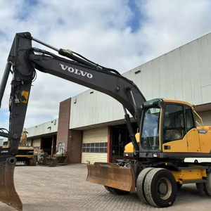 Excavatrice sur pneus Volvo EW180 originale d'occasion de marque suédoise en bon état pour les travaux de construction à bas prix à vendre - Product Image 1