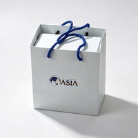 Boîte cadeau rigide magnétique bleue personnalisée avec insert en mousse et sac, emballage imprimé pour montre, bijoux, accessoires, ensemble de marque de luxe