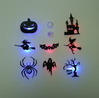 Décorations d'Halloween : 12 autocollants muraux LED lumineux (Citrouille, Sorcière, Chauve-souris, Fantôme, Araignée, Maison Hantée, Arbre Mort)
