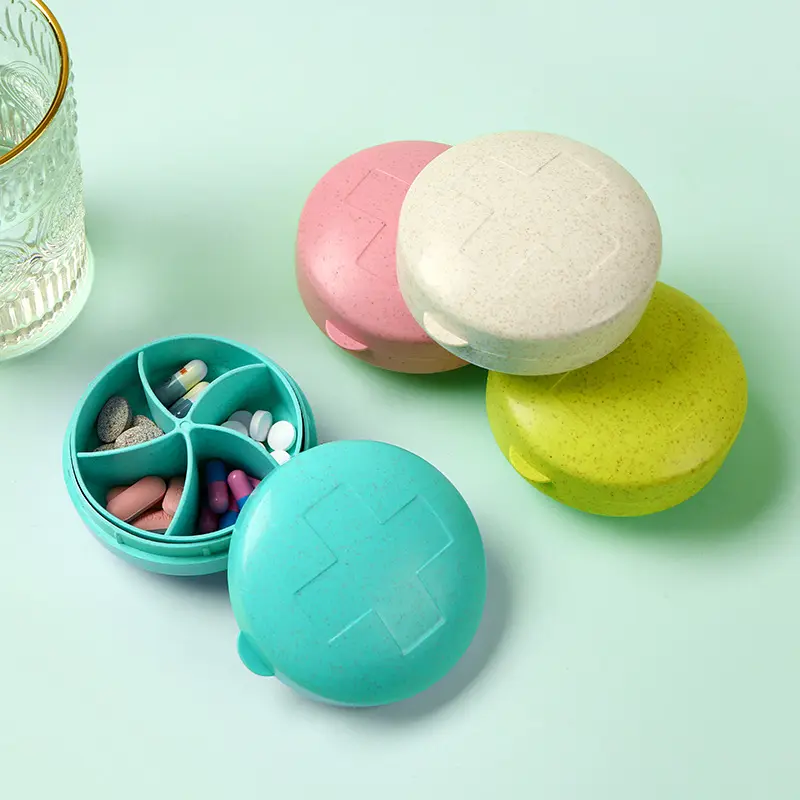 Warenlager weizenstroh mini-kunststoff-ein-tag-pillenbox personalisierte runde pillen-organisator-box aus kunststoff
