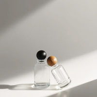 Flacon de parfum cylindrique moderne en verre avec couvercle en bois, 30ml, 50ml, 100ml, avec capuchon pulvérisateur et diffuseur à bâtonnets, emballage de luxe, vente en gros