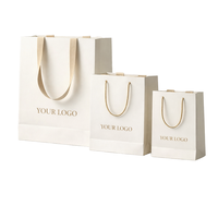 Luxury Clothing Gift Shopping Packaging Paper Bags Kraft Paper Retail Packing Pink White Craft Paper Hot Stamping Paperboard