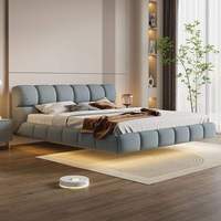Lit flottant simple moderne crème vent oreilles d'éléphant suspendus en cuir Napa chambre principale lit double