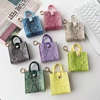 Mini sac antichoc en cuir PU motif peau de serpent, pendentif pour écouteurs, rouge à lèvres, porte-clés de voiture, doux et durable, cadeau pour femme