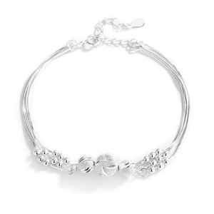 Bracelet anti-stress en cuivre plaqué or blanc, chaîne fine multi-couches avec perles porte-bonheur rotatives, bijou anti-anxiété tendance - Product Image 1