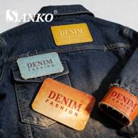 Étiquettes enroulées SANKO personnalisées en cuir PU gaufré, lavables et écologiques, à découpe droite, pour vêtements et patchs de sacs