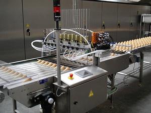 Lini produksi es krim otomatis, tanaman pelapis coklat dengan Motor sebagai komponen inti