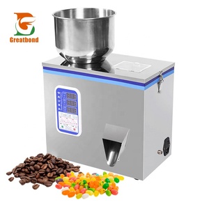 Machine de remplissage et de pesage semi-automatique de table compacte à bas prix pour sachets de 100g et 200g, pour grains, semences, noix, sucre, café, sel, thé et granulés - Product Image 1