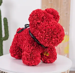Cadeau de noël à la main en gros fleur en mousse rose chien ours