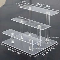 Présentoir carré en acrylique transparent de 20 cm sur 3 niveaux pour parfums et cupcakes en magasin de détail