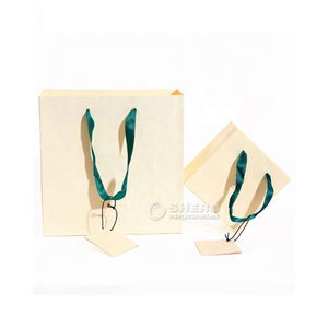 Custom Printed Boutique Cardboard Paper Bags Wholesale Small Jewelry Gift Bag With Three-<b>string</b> Handles - Product Image 3