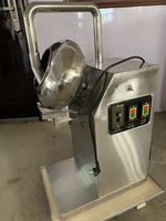 Machine à enrober les noix, les arachides, les amandes et les raisins