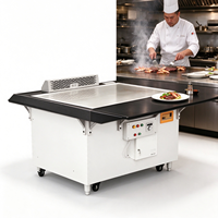 Table de Teppanyaki Électrique de Luxe Noire à 7 Places avec Évacuation des Fumées par Aspiration pour Hôtels et Restaurants