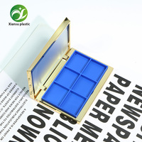 Boîte à fards à paupières rectangulaire bleue de luxe à six compartiments avec bord doré, emballage cosmétique en plastique personnalisable en gros