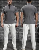 T-shirt de sport LAYENNE 180GSM à compression pour la gym et le fitness, avec logo personnalisé, élasticité, séchage rapide, fermeture éclair 1/4 pour hommes