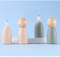 Nouvelles bouteilles à bille en verre transparent de 12 ml avec bouchon en bois et rouleau métallique, couleurs rose mat, vert et transparent, pour huiles essentielles et parfums.