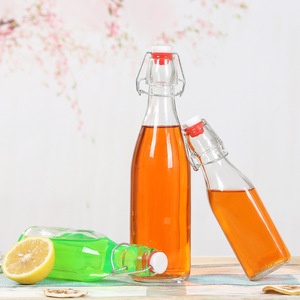 <span class=keywords><strong>Precio</strong></span> de fábrica 2025 Diseño novedoso Tapa acanalada sellada Personalizada 250ml/500ml/1000ml Botella de vidrio con tapa giratoria redonda transparente - Product Image 3