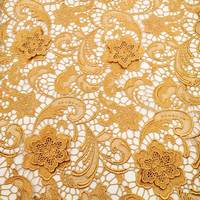 Tissu de dentelle de fleurs brodées en dentelle dorée Tissu de dentelle soluble dans l'eau Tissu de broderie à motifs de cachemire pour tenue décontractée