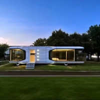 Maison Modulaire en Panneaux Sandwich Métalliques à 2 Étages, Connectée à l'Énergie Solaire, pour Bureaux, Hôtels, Centres Commerciaux – Design Moderne et Rapide