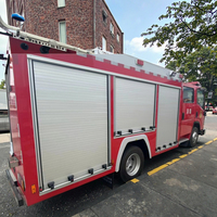 Design moderne, volets roulants en alliage d'aluminium, portes coulissantes manuelles ignifuges et étanches, matériel de verrouillage pour camions de pompiers d'hôtels