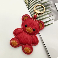 Nouveau porte-clés tendance en forme de petit ours avec mousqueton, en cuir PU écologique de haute qualité, pour la décoration de sac et comme pendentif pour clés de voiture