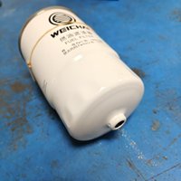 Auténtico filtro de combustible WEICHAI WP2 1000213843 nueva condición para piezas de autobús KINGLONG HIGER Reposabrazos de marca Original