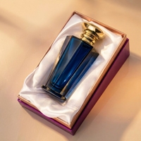Nouvelle conception de flacon de parfum en verre à col cranté de forme unique, 100 ml, ambre bleu, flacon de parfum vide avec vaporisateur à fine brume