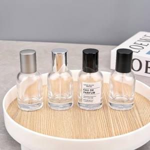 Vente flash : Flacons de parfum personnalisés <span class=keywords><strong>Labo</strong></span> 30 ml, 50 ml, 100 ml, flacons de parfum ronds en verre, vaporisateur de parfum unique avec couvercle en bois argenté noir - Product Image 1