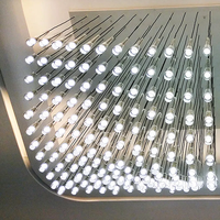 Lustre de salle à manger à coupe en cristal personnalisé de style moderne, de conception paramétrique créative