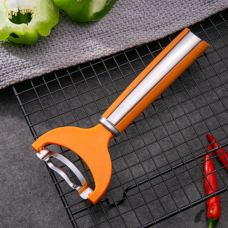 Cepillo para queso naranja