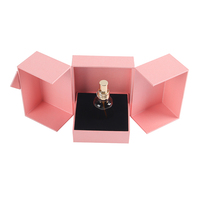 Boîte en carton rigide magnétique recyclable à double porte rose avec logo personnalisé de luxe, insert en EVA, lamination brillante pour flacons de parfum